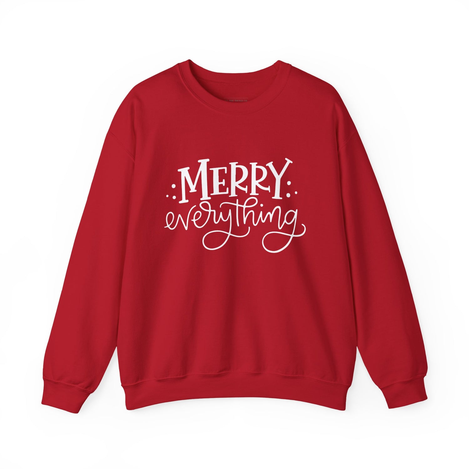 Red sweatshirt with 'Merry Everything' text on a white background