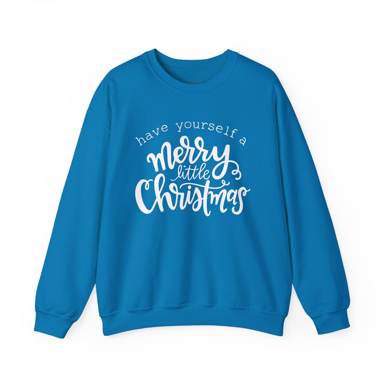 Blue sweatshirt with white text 'have yourself a merry little Christmas' on a white background