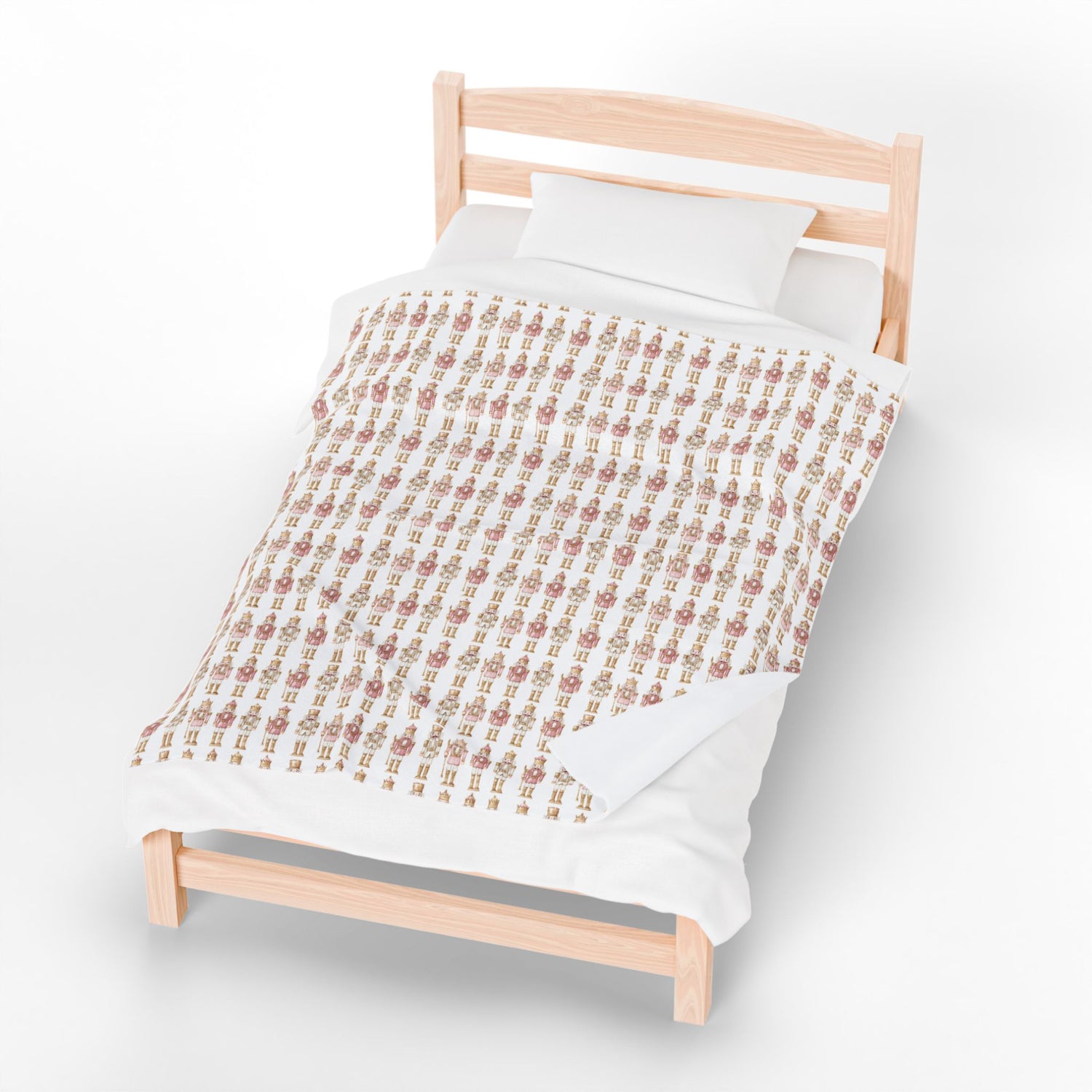 Wooden bed with a patterned duvet on a white background