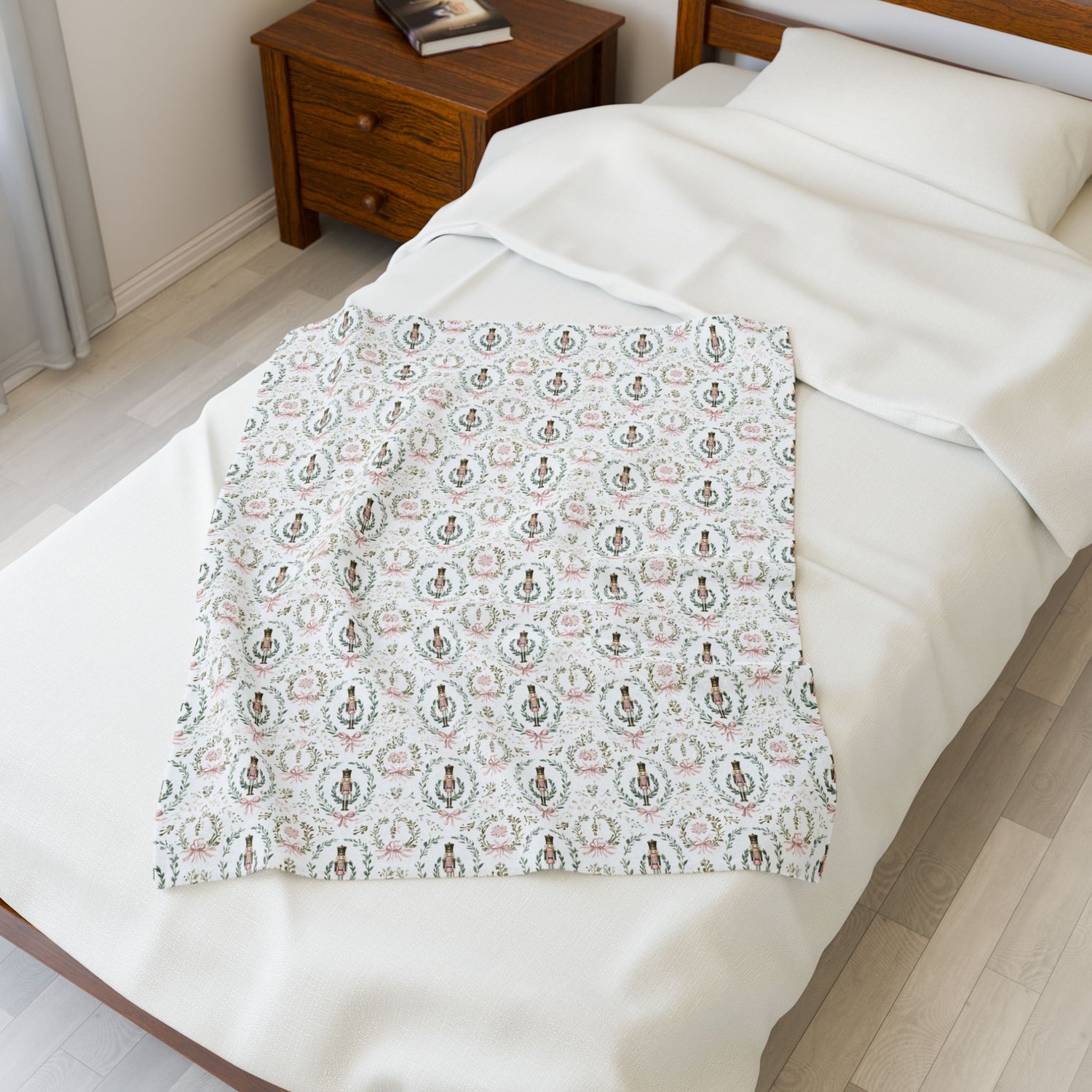 Floral patterned blanket on a bed in a bedroom setting