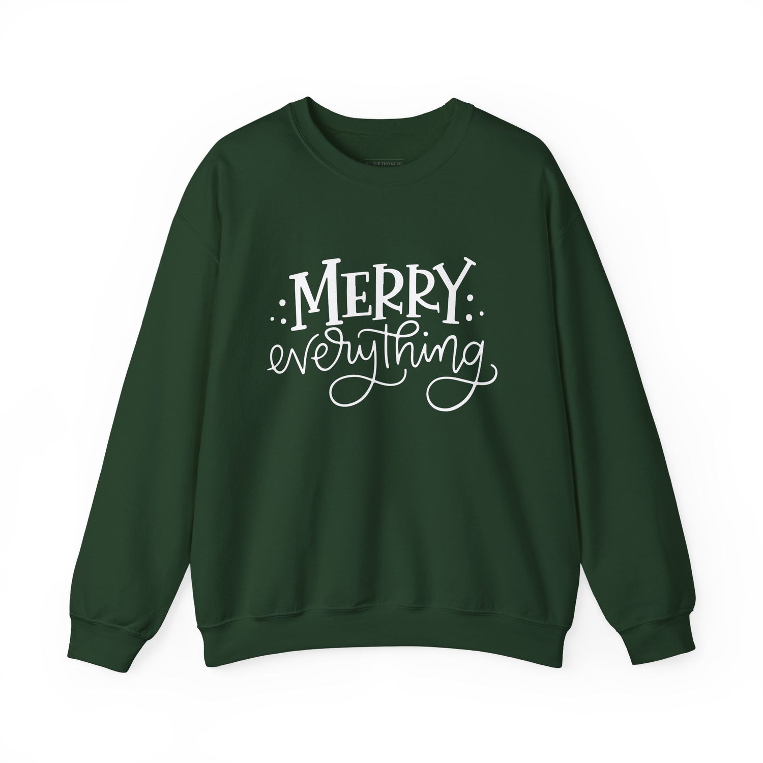 Green sweatshirt with 'Merry Everything' text on a white background