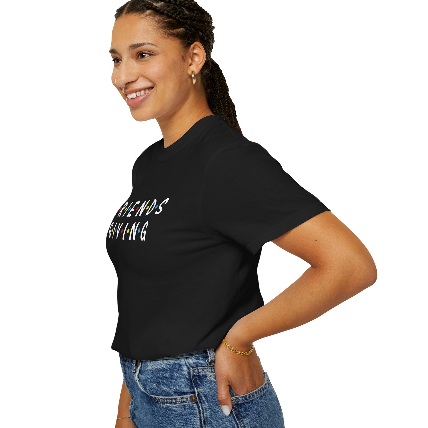 Woman wearing a black t-shirt with 'Friends' text on a white background