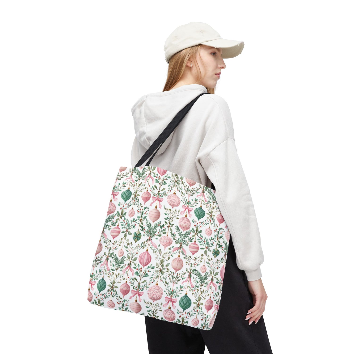 Person wearing a floral-patterned backpack on a white background