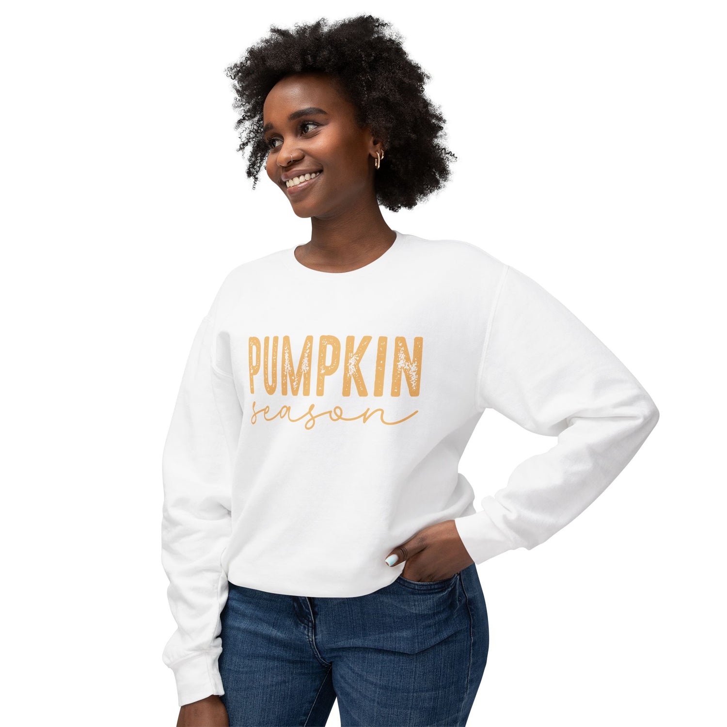 Woman wearing a white sweatshirt with 'Pumpkin Season' text on a white background