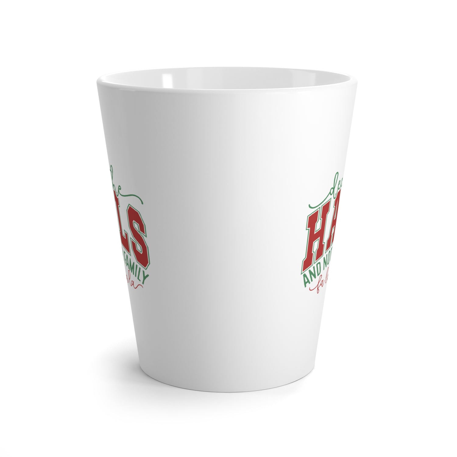 White ceramic mug with red and green text on a white background