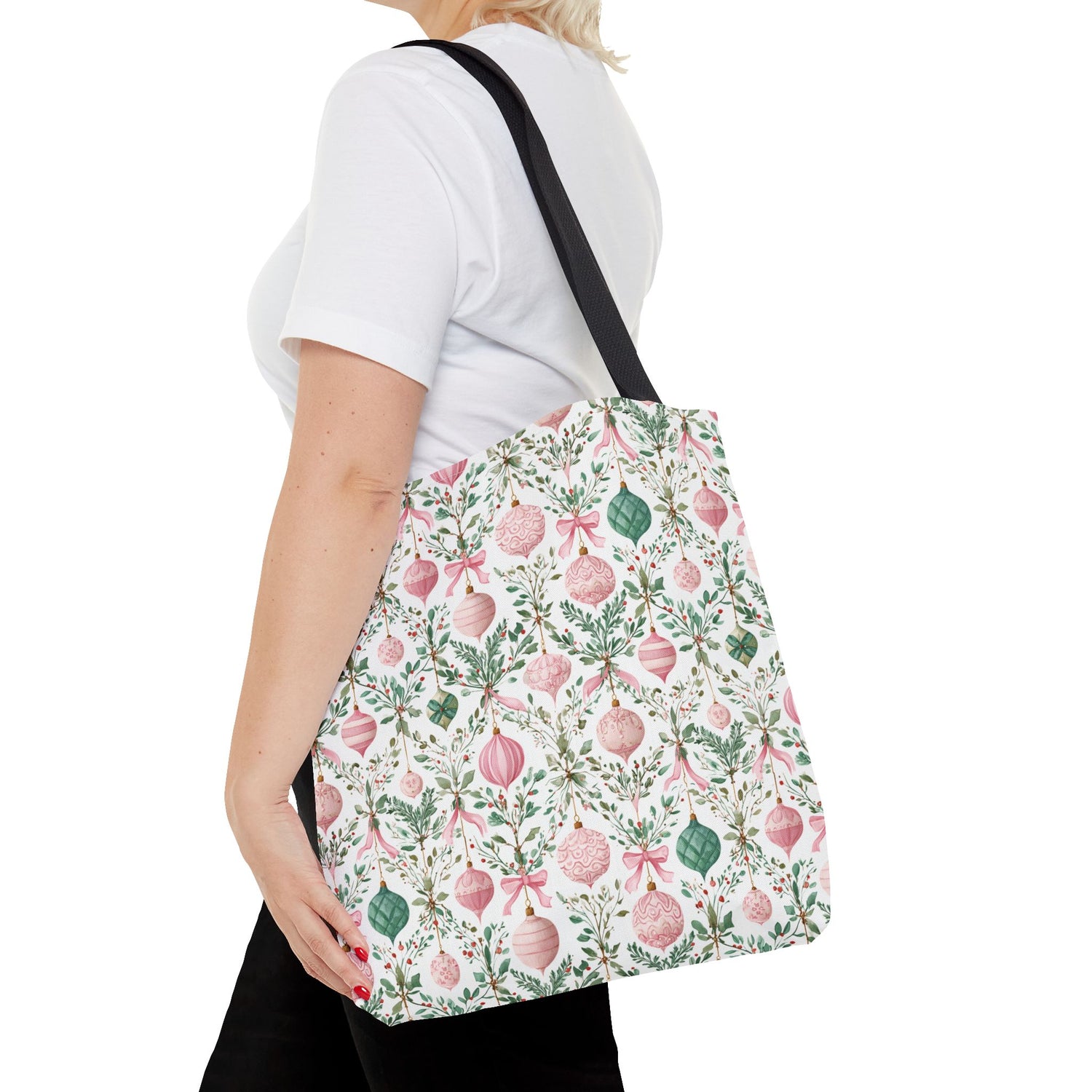 Person wearing a floral-patterned tote bag on a white background